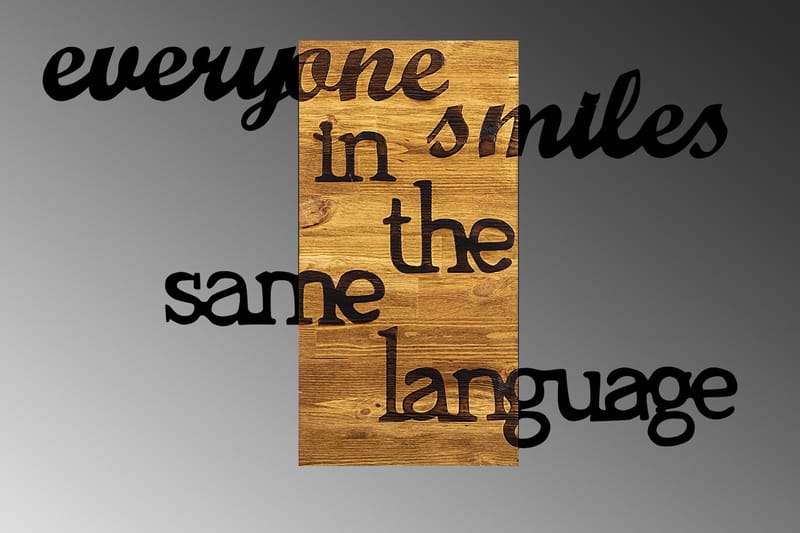 Everyone Smiles in The Same Language Vægdekor - Sort/Valnød - Boligtilbehør - Vægdekoration - Skilt - Emaljeskilte