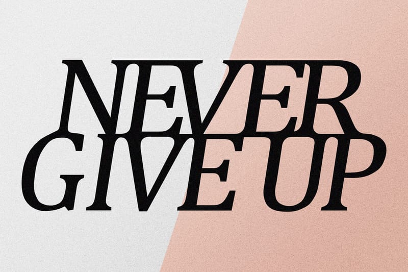 Never Give Up Vægdekor - Sort - Boligtilbehør - Vægdekoration - Skilt - Emaljeskilte